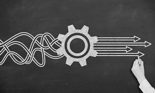 Hand drawing on a chalkboard, depicting a gear transforming chaotic lines into straight arrows, symbolizing optimization and efficiency.